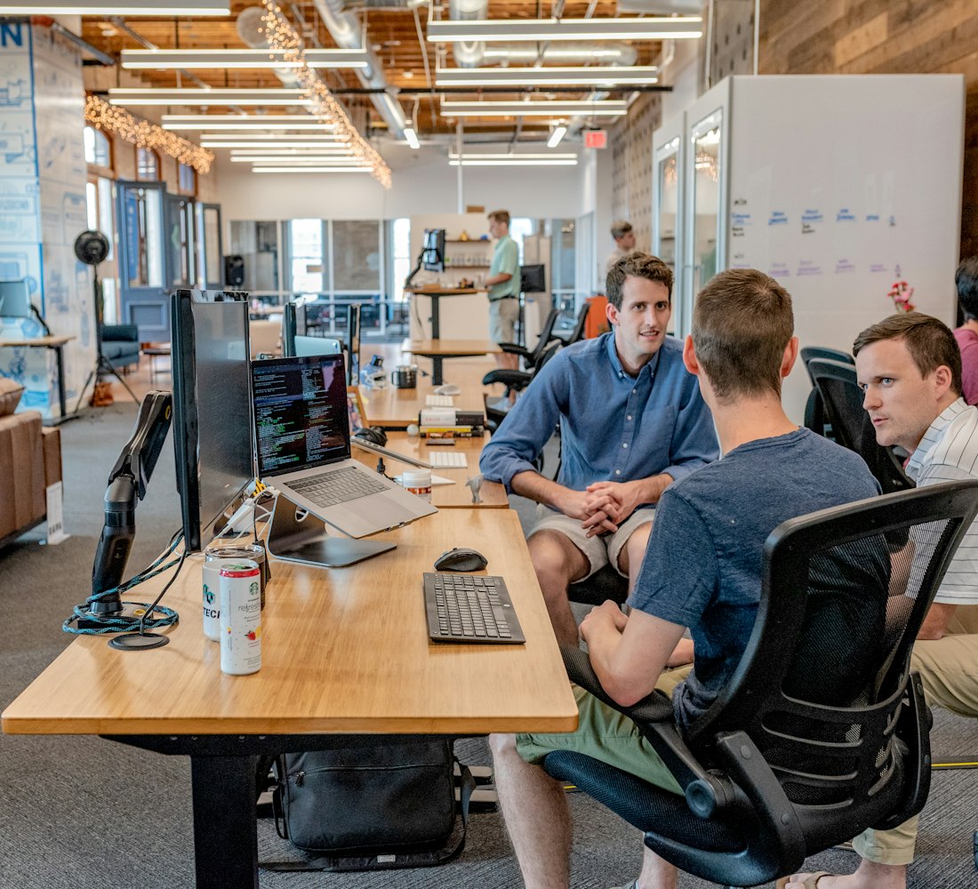 The Third Octopus team collaborating in the office